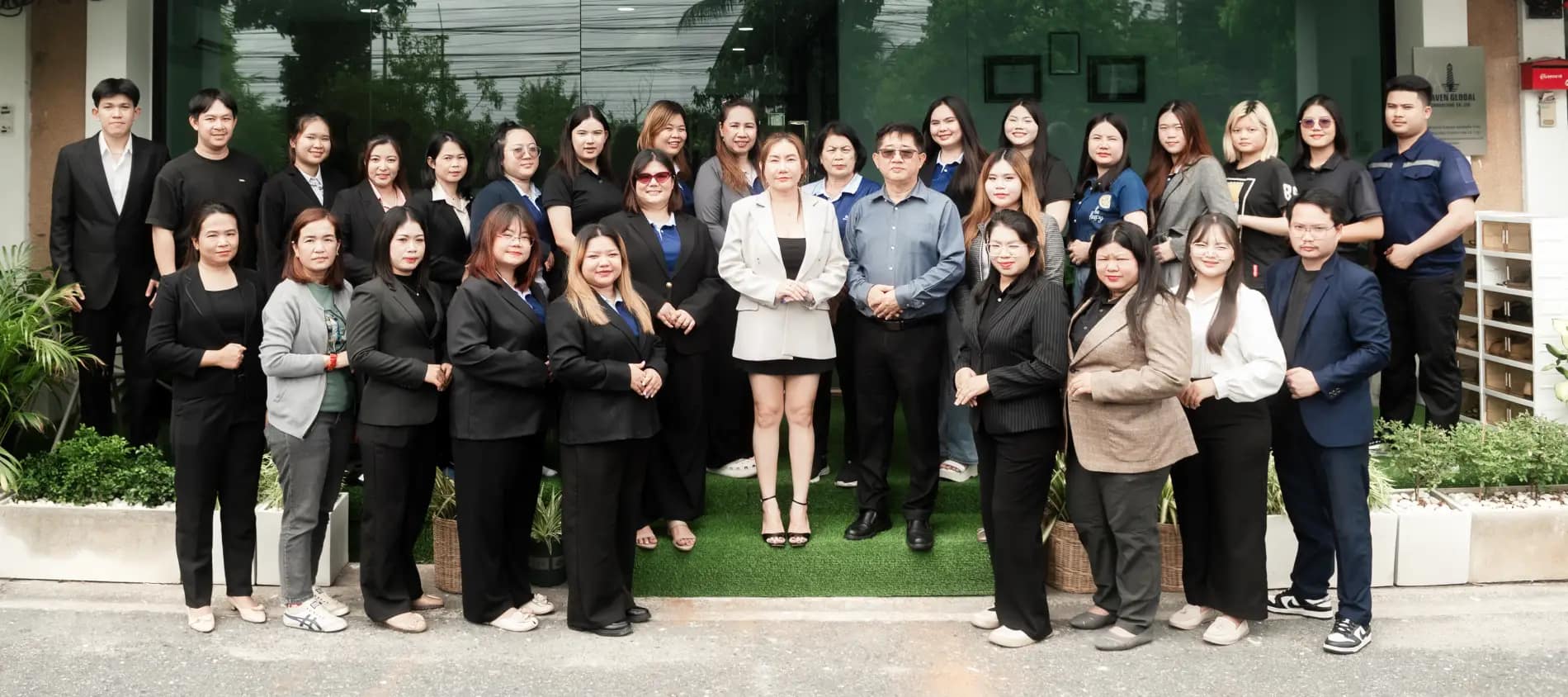 Our BOI team in Thailand in front of our office in Chonburi